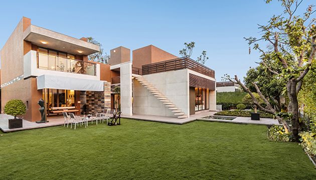 Contemporary villa surrounded by a landscaped garden