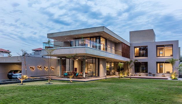 Modern family home with a broad green lawn